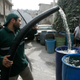 A city pipa worker delivers a weekly ration of water for residents. In some parts of the city, the government provides water rations. In other parts, residents pay for it. In both cases, waiting for water to arrive can be a full-time job.